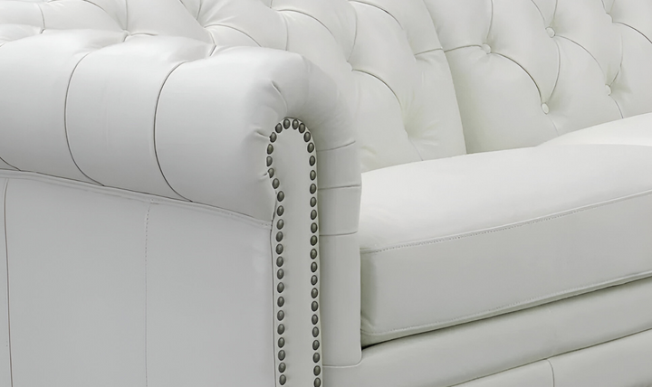 Aliso Leather Sectional Sofa with Nailhead Finish in Cream White