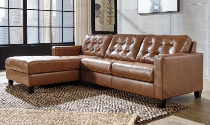 Baskove Leather Sectional In Auburn