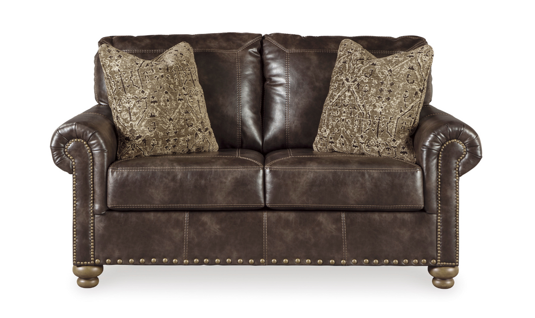 Ashley Nicorvo Leather Loveseat with Rolled Arms in Coffee-Jennifer Furniture