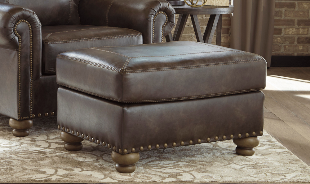 Ashley Nicorvo Firmly Cushioned Leather Ottoman in Coffee-Jennifer Furniture