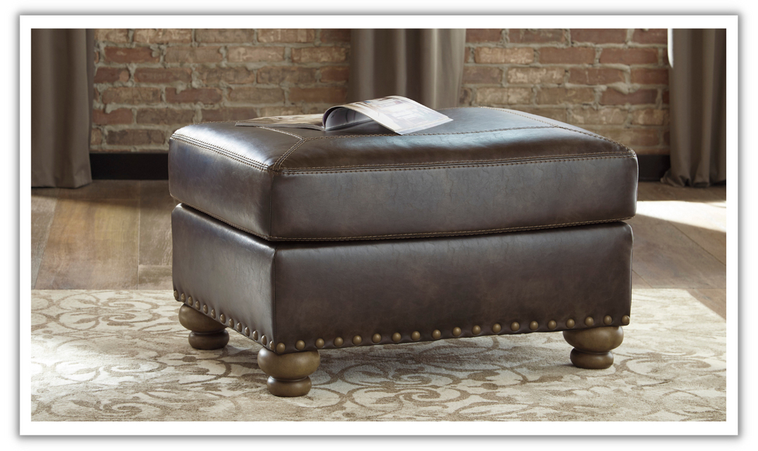 Ashley Nicorvo Firmly Cushioned Leather Ottoman in Coffee-Jennifer Furniture